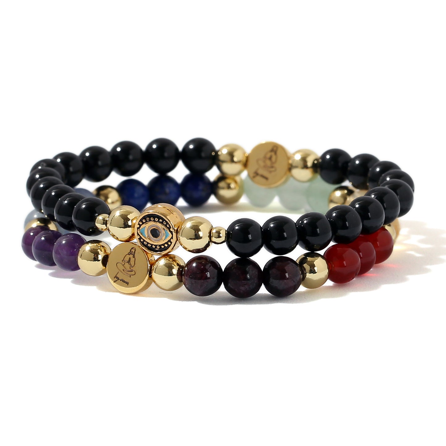 Stack of beaded bracelets with gold accents on a white background