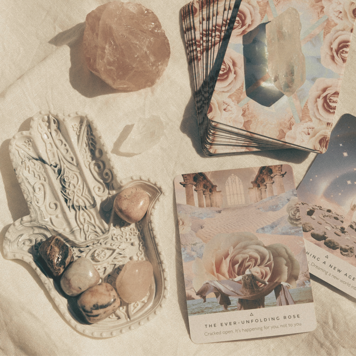 Set of tarot cards with decorative elements on a textured surface