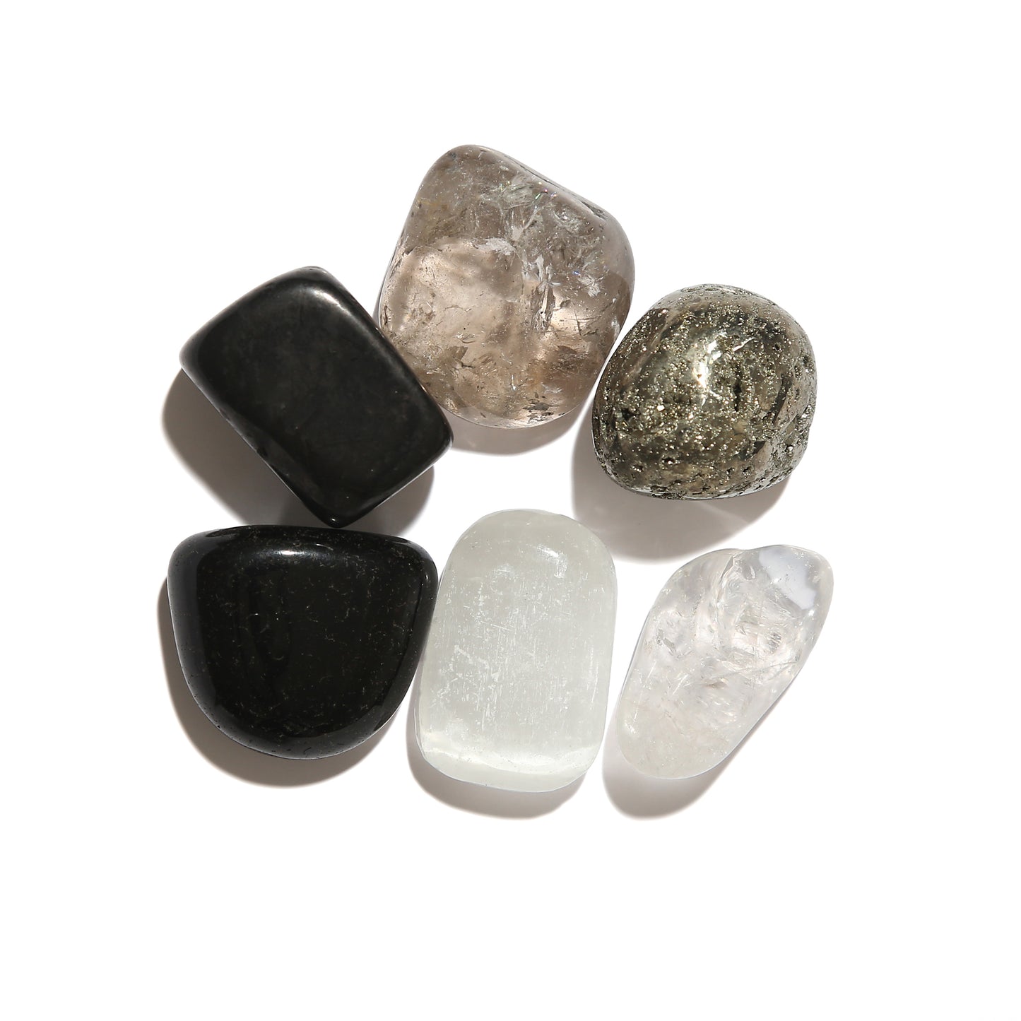 Collection of various crystals on a white background