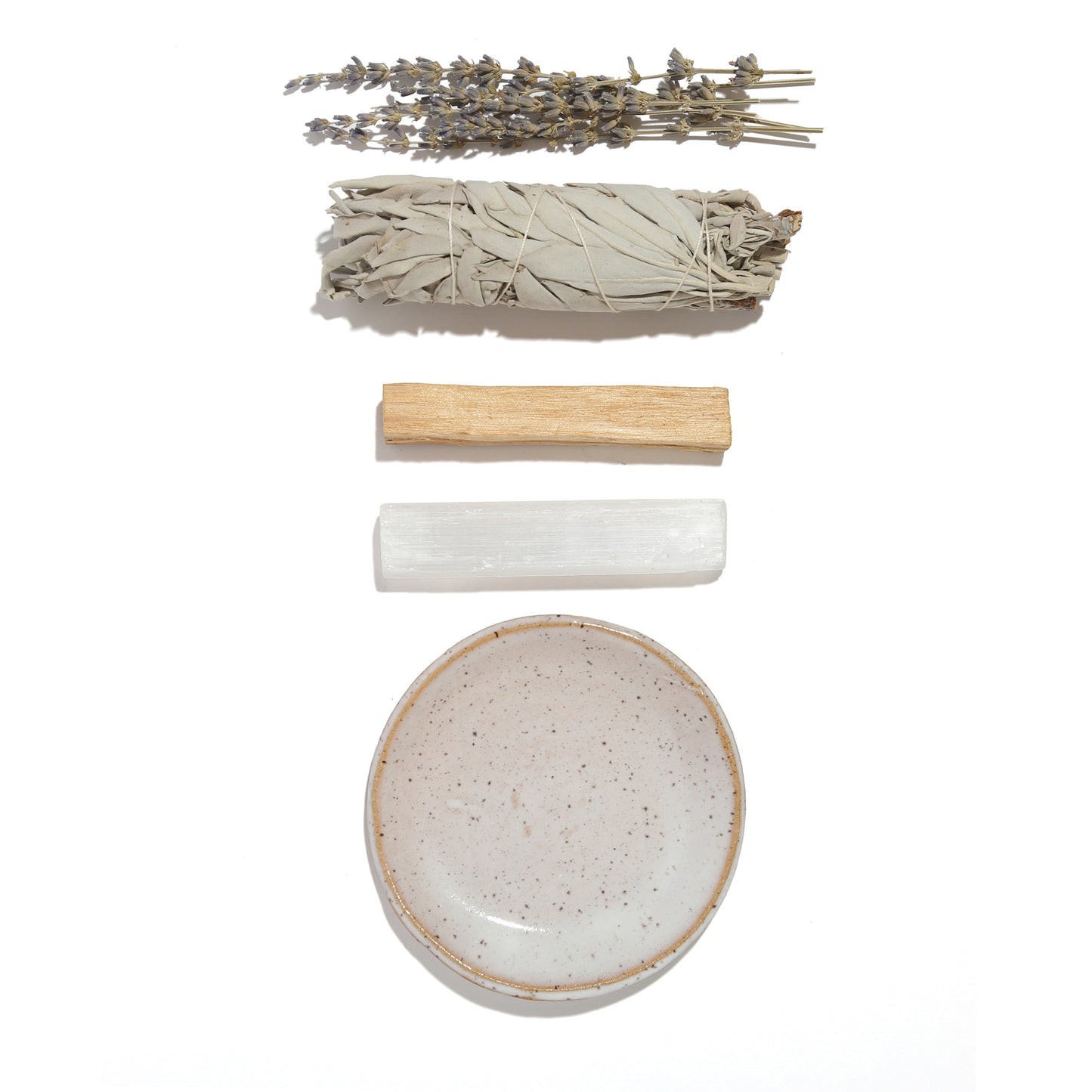 Set of incense sticks, sage, lavender, and a ceramic dish on a white background